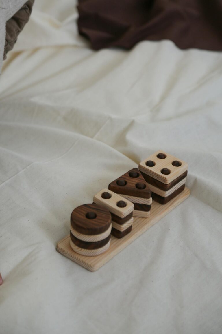 A wooden toy with the word dice on it